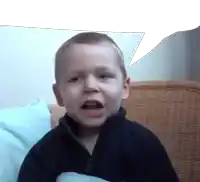 a young boy with a speech bubble behind him