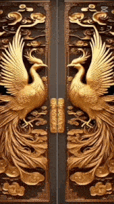 a pair of doors with a statue of a phoenix on them