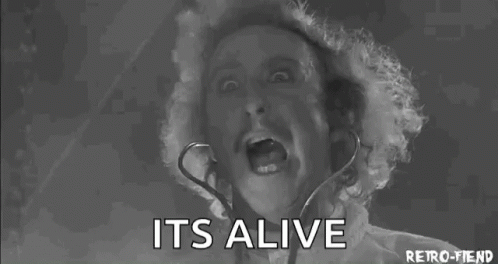Gene Wilder gif from Young Frankenstein with text: "Its Alive" From https://media.tenor.com/SuADVxKkQ-AAAAAC/frankenstein-its-alive.gif