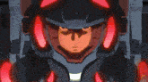 a close up of a robot 's face with red lights