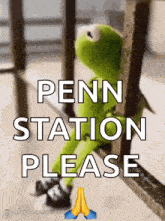 a kermit the frog sitting on a railing with the words penn station please written on it