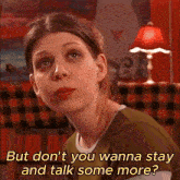 a woman in a green shirt says " but don t you wanna stay and talk some more "