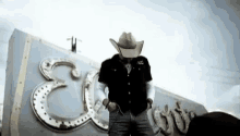 Heads Up Hands In Pocket GIF - Heads Up Hands In Pocket Cowboy Hat GIFs