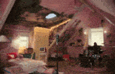 a girl 's bedroom with a drum set and a tv