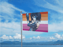 a flag with a picture of a girl on it against a blue sky
