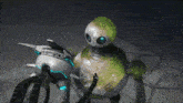 a robot with green eyes and a white head