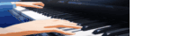 a person is playing a piano in a blurry picture