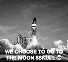a black and white photo of a rocket with the words we choose to go to the moon skull