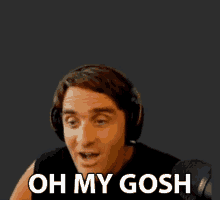 a man wearing headphones is making a funny face and says oh my gosh .