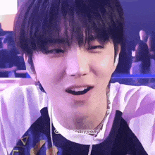 a close up of a person 's face with a caption that says ' commyeong '