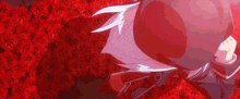 a person is standing in front of a bunch of red flowers and holding a gun .