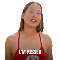 a woman in a red tank top with the words i 'm pissed on it