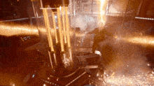 a person is standing in a room with a lot of lights and sparks coming out of it