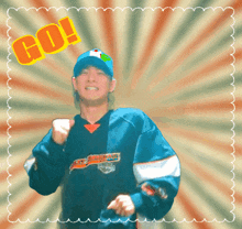 a man wearing a harley davidson shirt is dancing in front of a sunburst