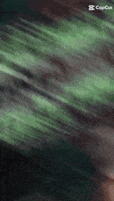 a green and black background that says capcut on the bottom right