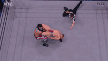 a wrestling match is being shown on a aew network