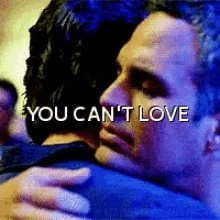 a man hugging another man with the words " you can 't love " on top