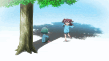 a girl in a blue shirt is running towards another girl