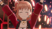 a girl with a red star on her chest is smiling with her arms in the air .