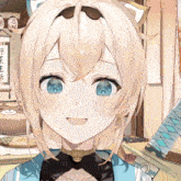 a girl with blonde hair and blue eyes is smiling in a room