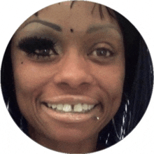 a close up of a woman 's face with a circle around it