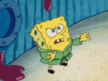 a cartoon character named spongebob wearing a green robe is standing on a sandy beach