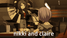 nikki and claire are sitting at a table