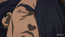 a close up of a man 's face with a netflix logo behind him