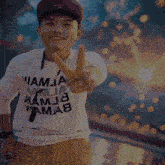 a man wearing a shirt that says " nama " on it