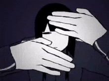 a person is covering another person 's eyes with their hands .