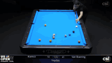 a pool table with a blue cloth that says diamond