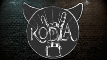 a drawing of a cat with the word kodia written on it
