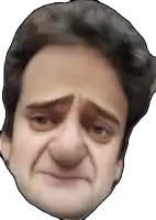 a close up of a man 's face making a sad face