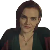 a close up of a woman 's face with a necklace