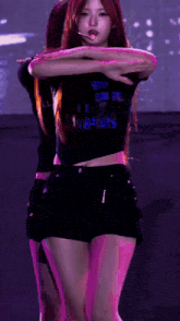 a girl wearing a black shirt that says girl you are a slots