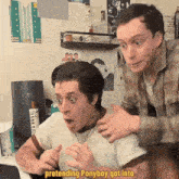 two men are pretending ponyboy got into a video