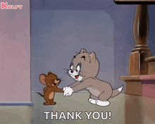 a cartoon of tom and jerry shaking hands with the words thank you on the bottom