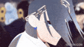 a gif from gifrun.com shows a girl with dark hair and blue earrings