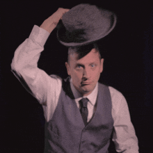 Putting On A Hat Tim Robinson GIF - Putting On A Hat Tim Robinson I Think You Should Leave With Tim Robinson GIFs