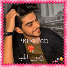 a picture of a man with the name khaled written above him