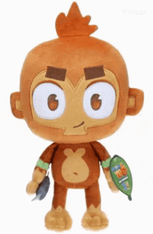 a stuffed monkey with a tag on it that says ' monkey ' on it