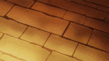 a close up of a brick wall with the sun shining on it