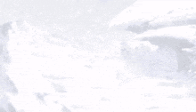 a painting of a snowy landscape with a person standing in the middle