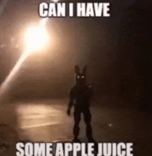 a silhouette of a bunny rabbit standing in front of a light .