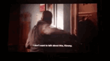 a movie screen shows a man talking to a woman and says i don 't want to talk about this kimmy .