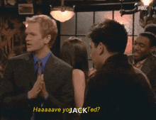 a man in a suit and tie says haaaave you jackted while talking to another man