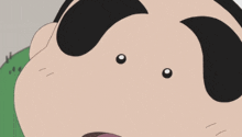 a close up of a cartoon character with two eyes