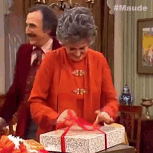 Open The Present Maude Findlay GIF - Open The Present Maude Findlay Walter Findlay GIFs