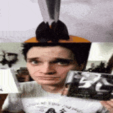 a man wearing a white shirt that says ' i 'm a fan ' on it