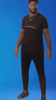 a man in a black shirt and black pants is standing on a blue background